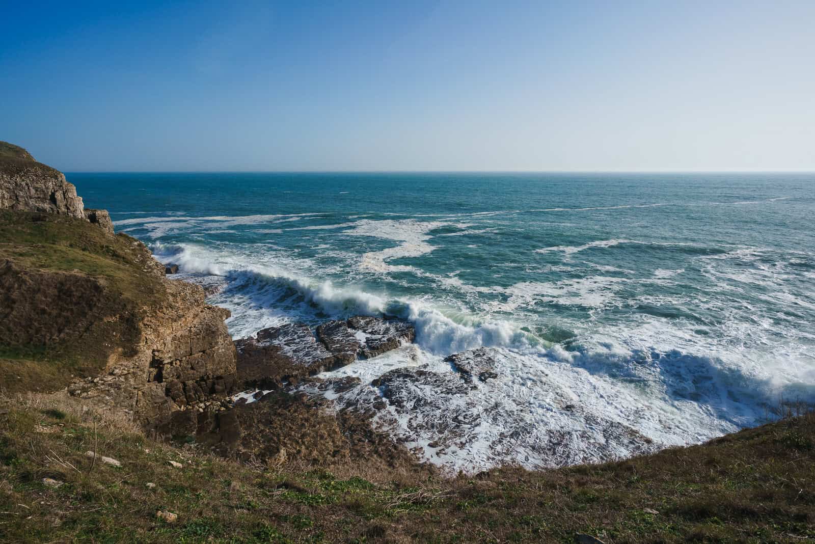 Waves crashing on the Seacombe ledge Dorset